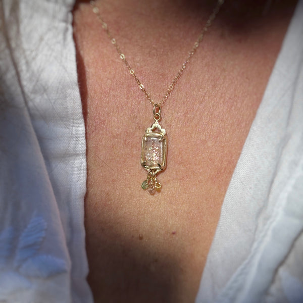 Myth and Stone Temple of Joy sunstone pendant on model