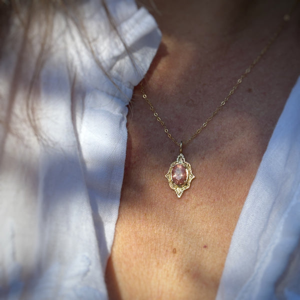 Myth and Stone Mystic Mirror sunstone pendant on model