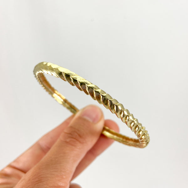 Myth and Stone Serpentine Bangle bracelet in bronze up close