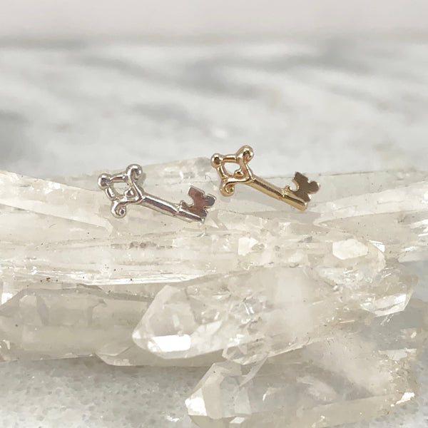 Myth and Stone Orfira's Key studs in silver and gold