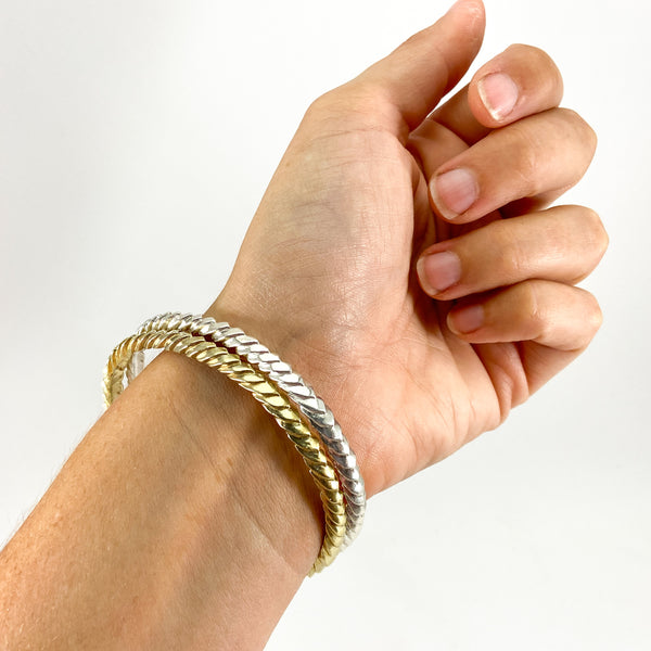 Myth and Stone Serpentine Bangle bracelets silver and bronze on model
