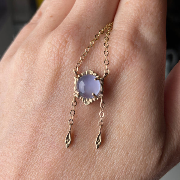 Myth and Stone Isla chalcedony necklace on hand
