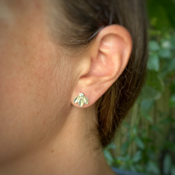 Myth and Stone Trilogy tourmaline studs on model