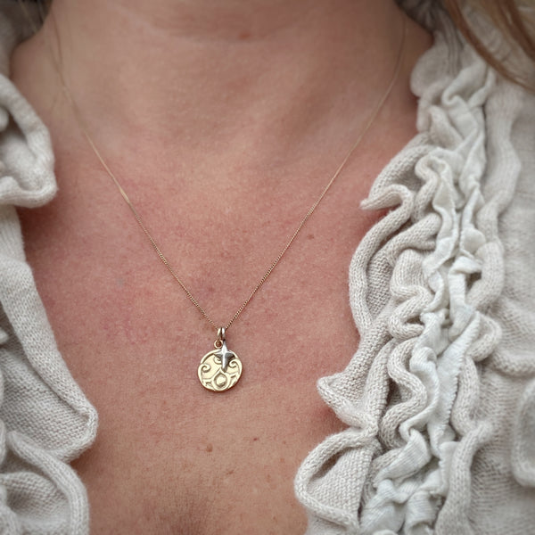 Myth and Stone Lotus medallion on model