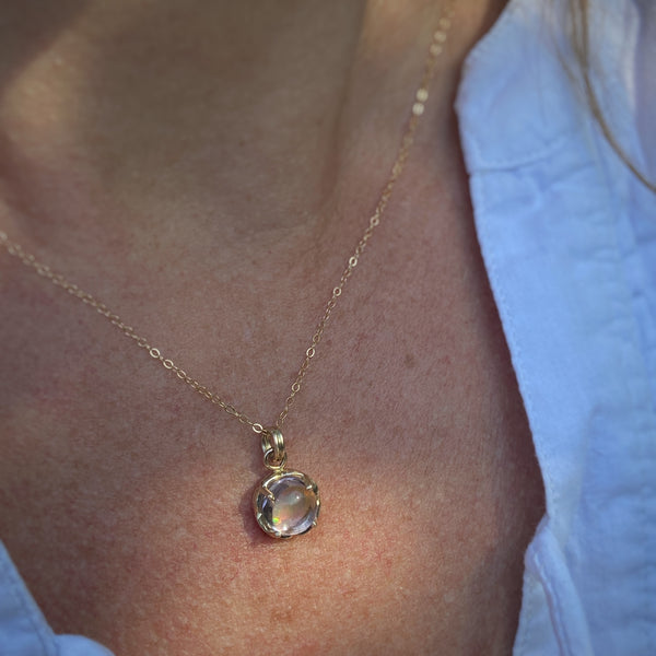 Myth and Stone Inner Light opal pendant on model