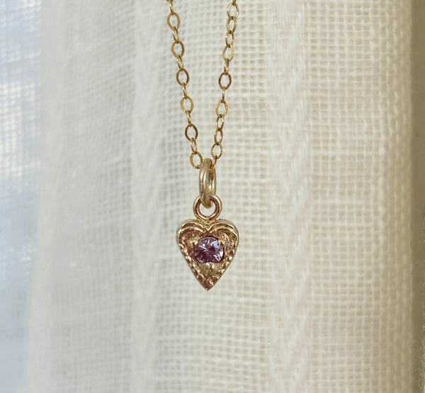 Myth and Stone Sweetheart charm in gold with pink spinel