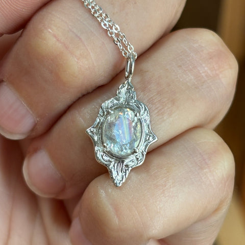 Myth and Stone Mystic Mirror moonstone pendant on hand