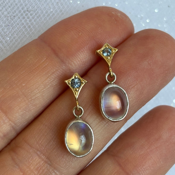 Myth and Stone Rainbow Moon earrings on hand