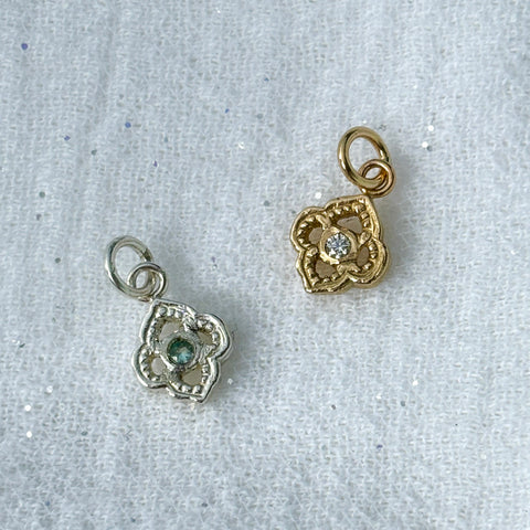 Myth and Stone Arabesque charms in silver and gold