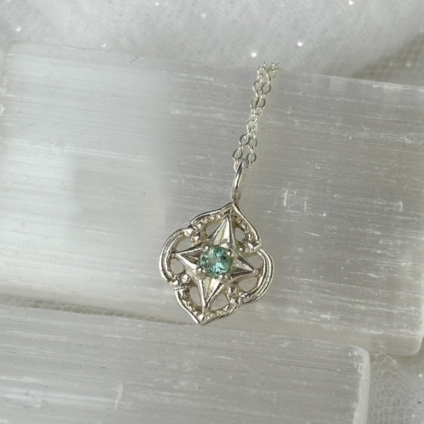 Myth and Stone Compass of Light pendant in silver with green beryl