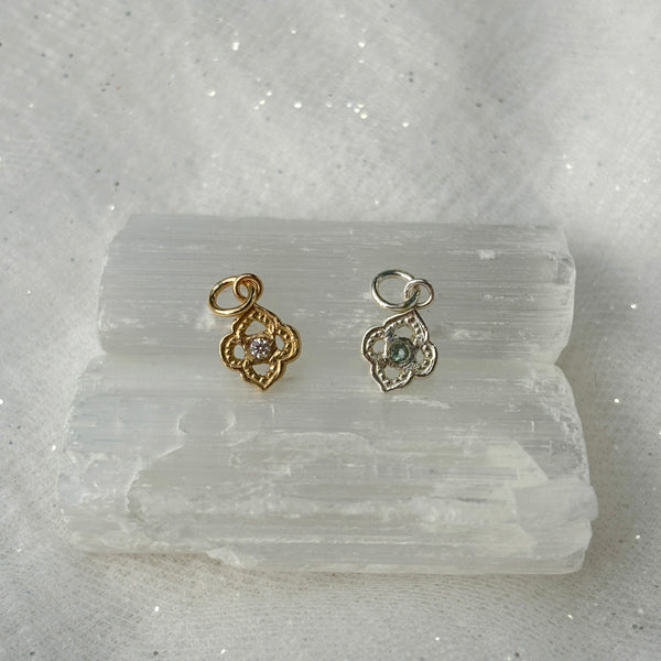 Myth and Stone Arabesque charms in silver and gold