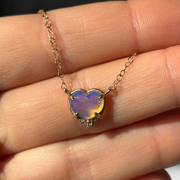 Myth and Stone Radiant heart opal necklace on hand