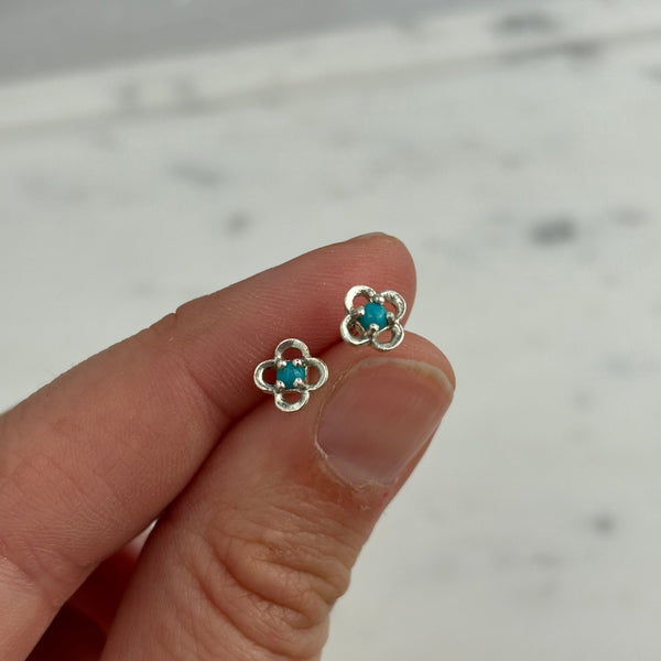 Myth and Stone Quatro turquoise studs in hand