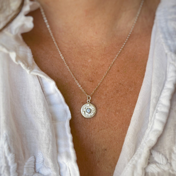 Myth and Stone Stars Align silver pendant on model