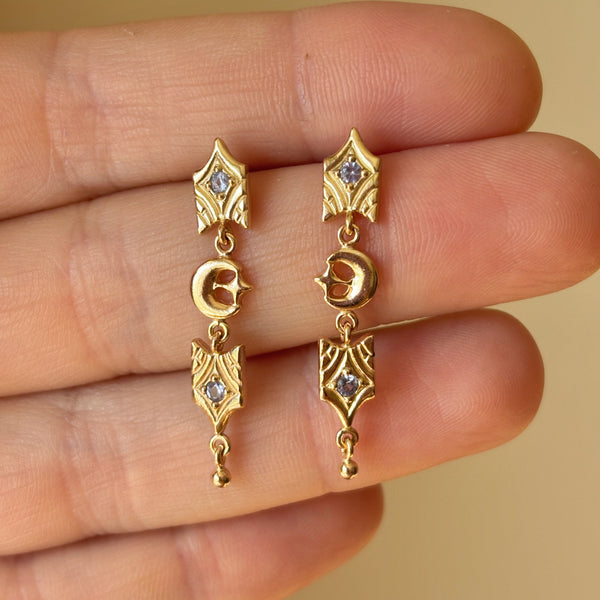 Myth and Stone Sweet Dreams earrings in gold on hand