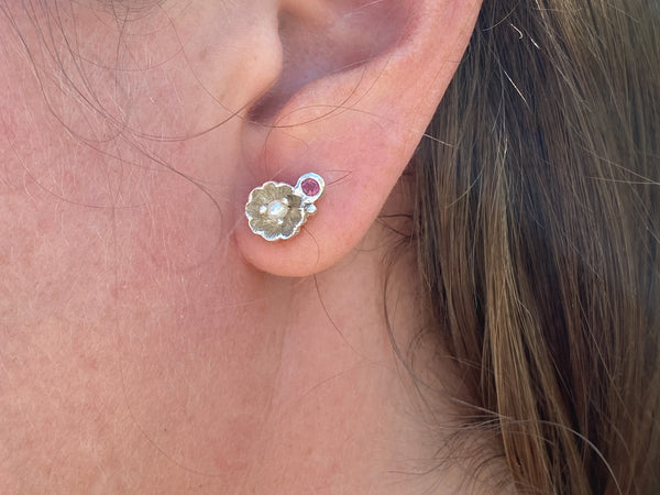 Myth and Stone blossom studs with pearl and sapphire on model
