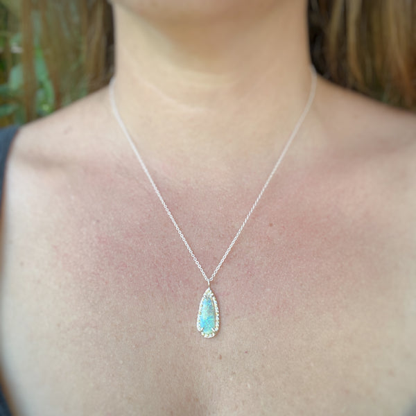 Myth and Stone Confetti Queen Opal pendant on model