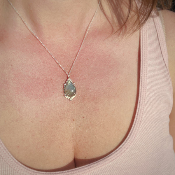 Myth and Stone Delphine labradorite pendant on model