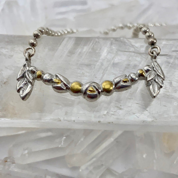 Myth and Stone La Fete necklace in silver and gold front view
