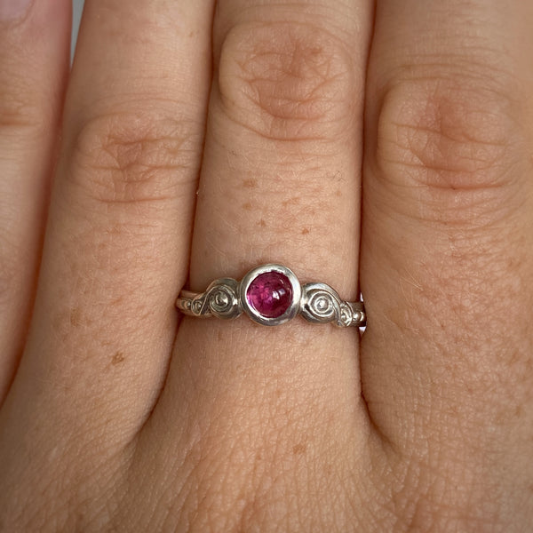Myth and Stone Curiosity ring in silver with pink on finger